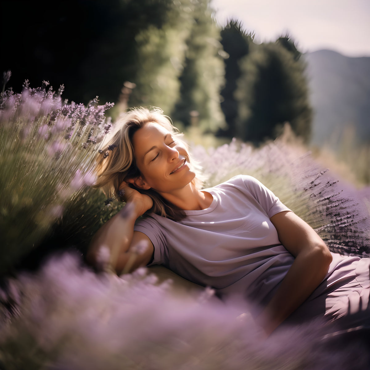 Woman resting peacefully in a lavender field